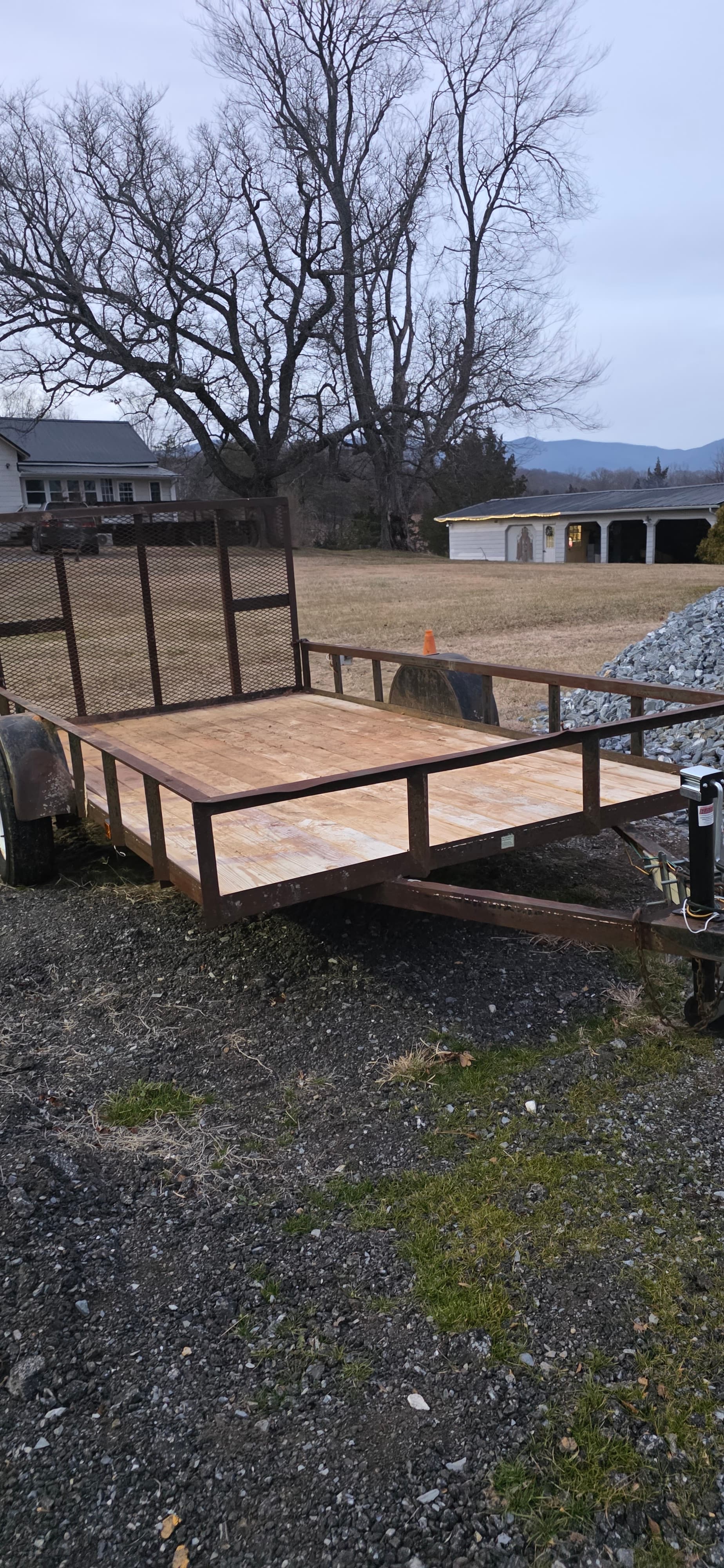 Utility Trailer for rent - Perfect for hauling landscaping materials, furniture, and general cargo.