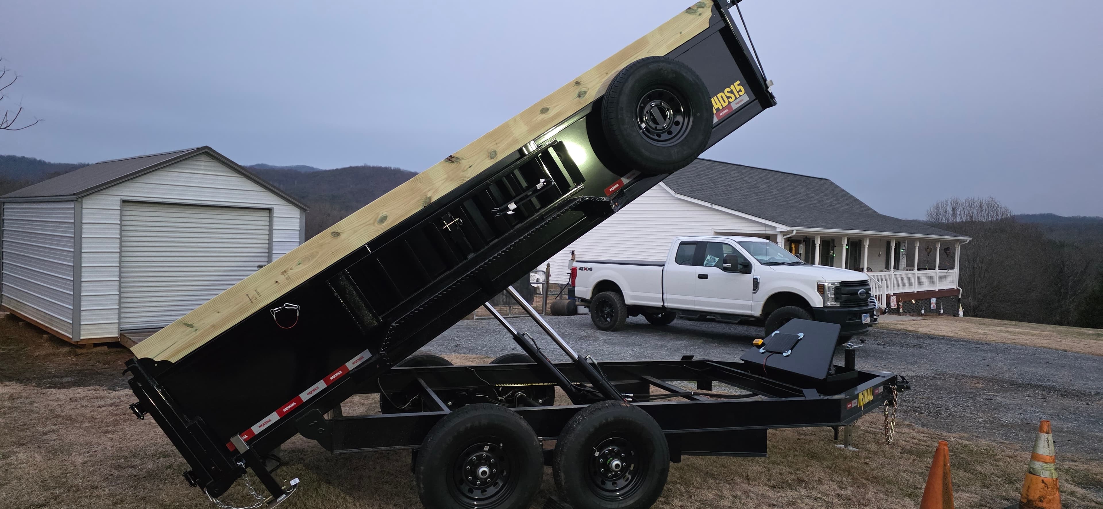 Dump Trailer for rent - Ideal for landscaping, construction debris, and heavy-duty hauling jobs.
